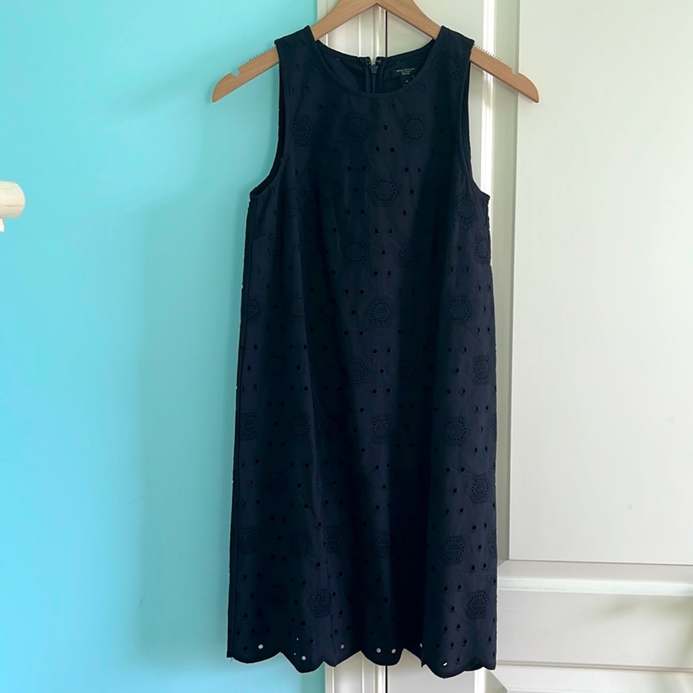 sleeveless black dress with hexagon designs